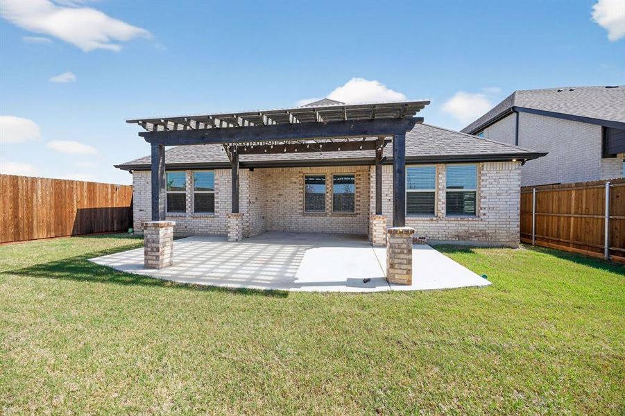 Exterior details and patio area of a home in Valencia on the Lake, Little Elm (Image 15). Exterior details and patio area of a home in Valencia on the Lake, Little Elm (Image 15).