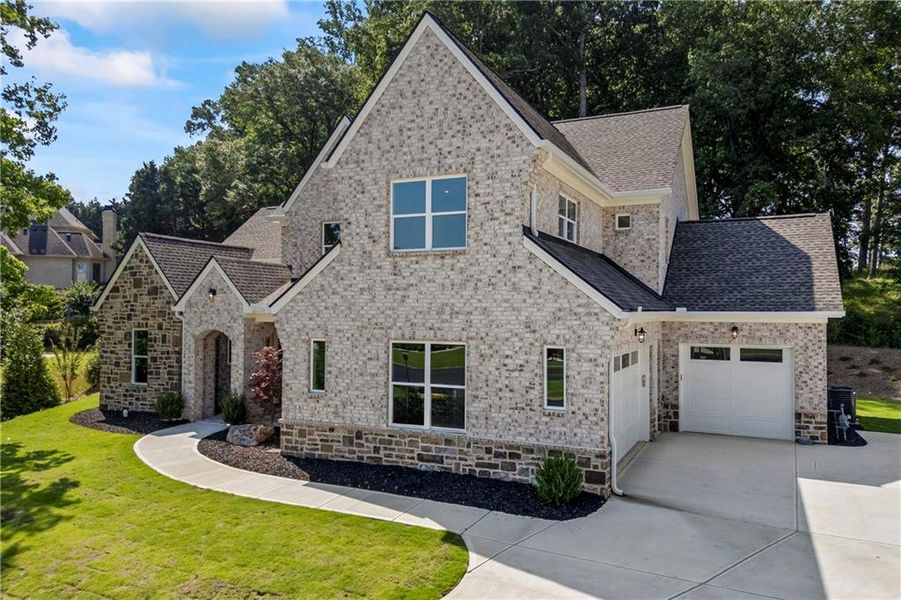 Front exterior of a new home in , Marietta, GA, highlighting curb appeal (Image 31).
