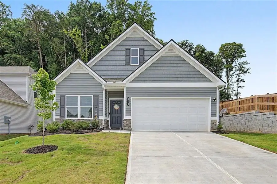 Front exterior of a new home in , Calhoun, GA, highlighting curb appeal (Image 22). Front exterior of a new home in , Calhoun, GA, highlighting curb appeal (Image 22).