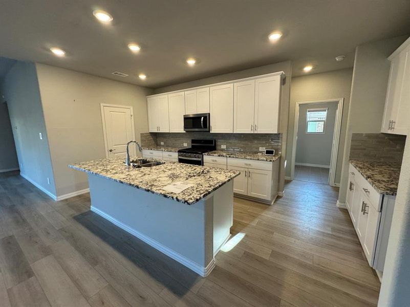 Furnished interior view inside a new home in Cibolo Hills, Fort Worth (Image 7). Furnished interior view inside a new home in Cibolo Hills, Fort Worth (Image 7).