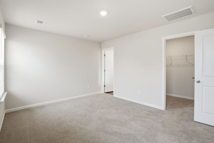 Representative unfurnished interior of a home built from the Juniper B by McGuinn Homes in Hunters Branch, Hopkins (Image 37).
