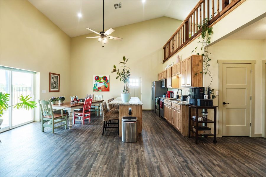 Dining room area leads to the back patio and enjoys views of the runway Dining room area leads to the back patio and enjoys views of the runway