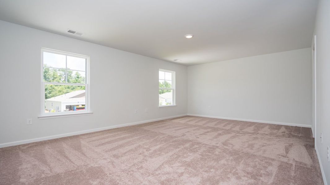 Representative unfurnished interior of a home built from the ROBIE by D.R. Horton in Indigo Preserve, Leland (Image 32).