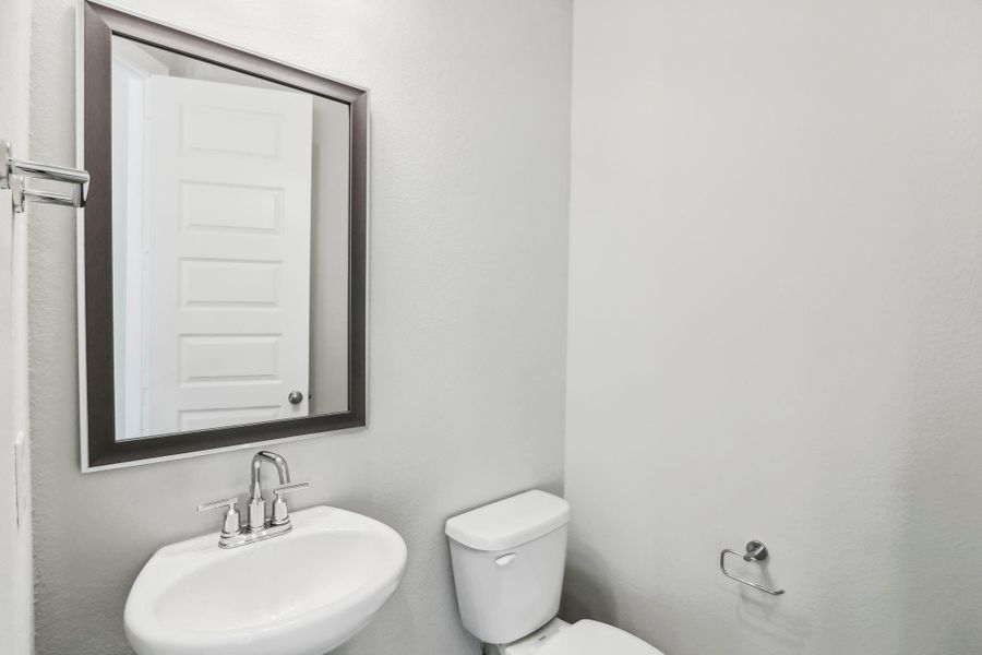 Photos are not of the actual home, but are photos of the builder home with same floorplan