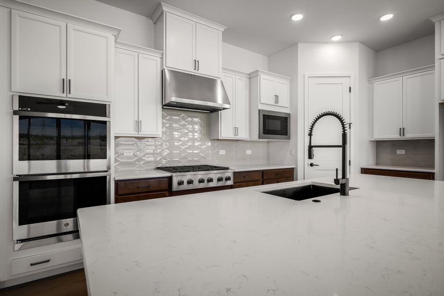 Furnished interior view inside a new home in Wolf Ranch - Enclave Collection, Colorado Springs (Image 7).