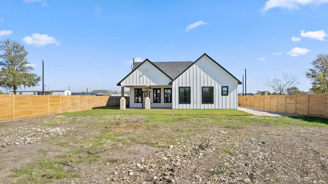 Front exterior of a new home in , Dale, TX, highlighting curb appeal (Image 1).