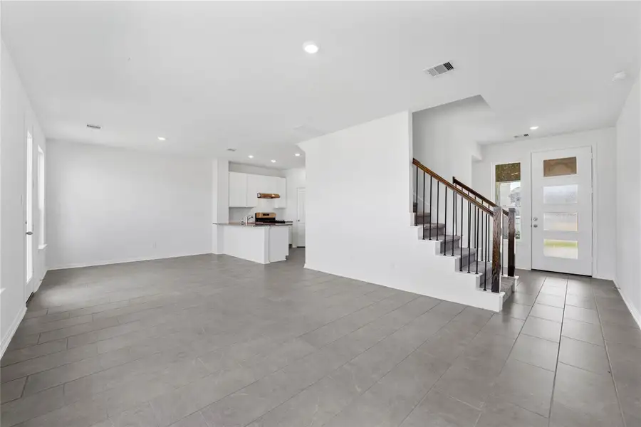 Stunning open-concept design seamlessly connecting the living, dining, and kitchen areas—perfect for both everyday living and entertaining! Stunning open-concept design seamlessly connecting the living, dining, and kitchen areas—perfect for both everyday living and entertaining!