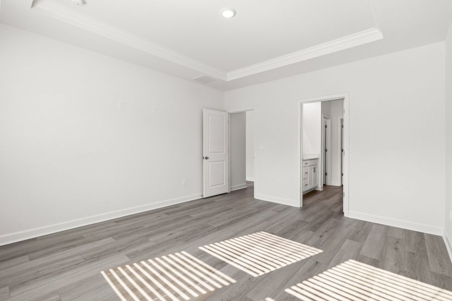 Spacious, unfurnished interior of a new home in Cypress Ridge - The Boardwalk Series, Longs (Image 22).