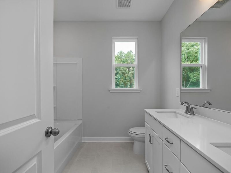 Furnished interior view inside a new home in Sage on North Main, Wake Forest (Image 9). Furnished interior view inside a new home in Sage on North Main, Wake Forest (Image 9).