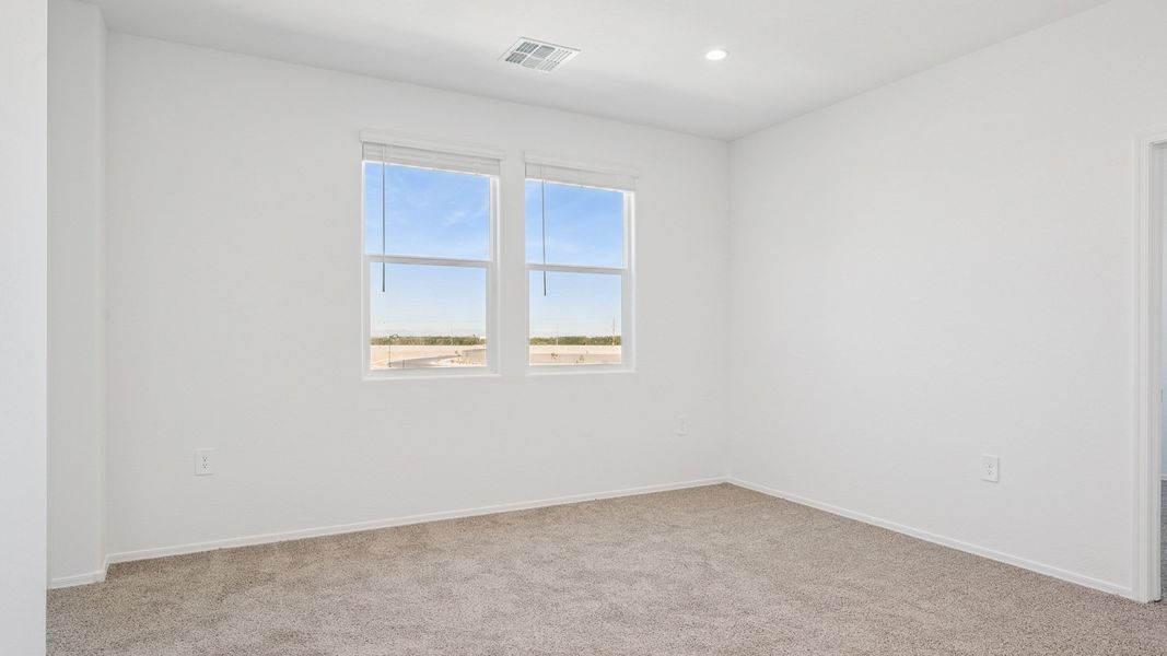 Representative unfurnished interior of a home built from the Ibis by D.R. Horton in Elena Trails, Maricopa (Image 27).