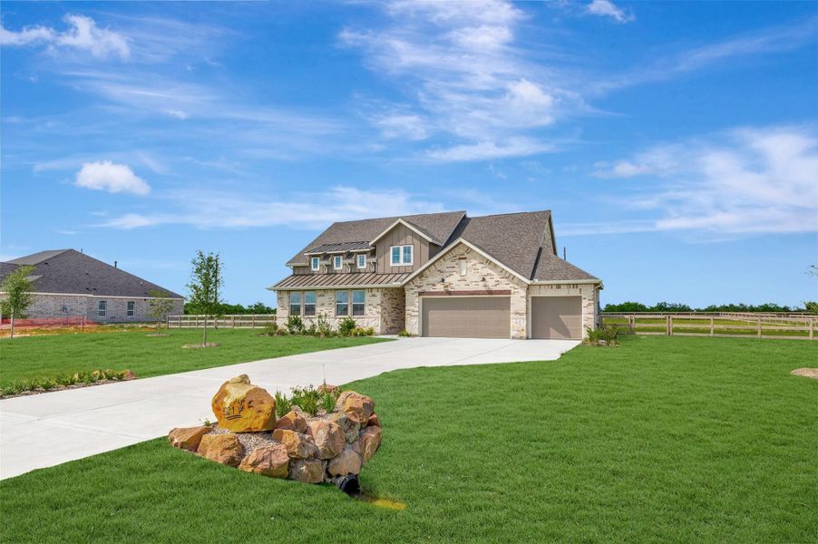 Front exterior of a new home in Lakeview, Waller, TX, highlighting curb appeal (Image 2). Front exterior of a new home in Lakeview, Waller, TX, highlighting curb appeal (Image 2).
