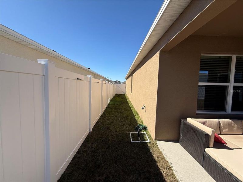 Exterior details and patio area of a home in Cypress Park Estates, Haines City (Image 27).