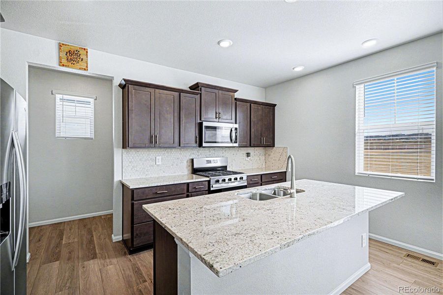 Furnished interior view inside a new home in Murphy Creek, Aurora (Image 15).