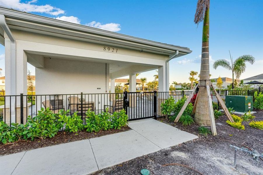 Exterior details and patio area of a home in Skye Ranch Community Group Page, Sarasota (Image 19).