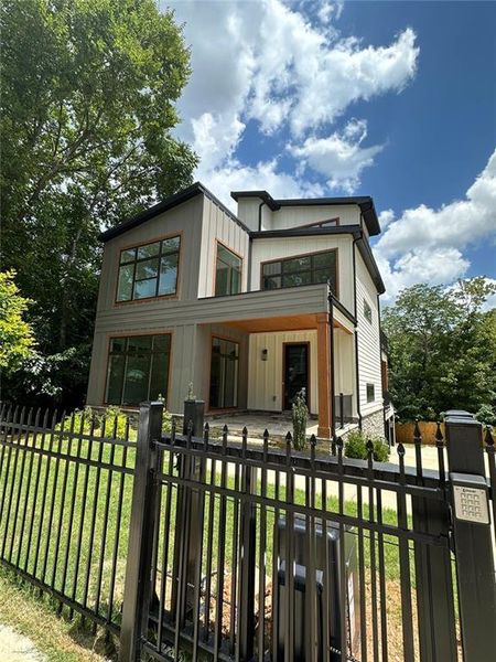 Front exterior of a new home in , Atlanta, GA, highlighting curb appeal (Image 29).