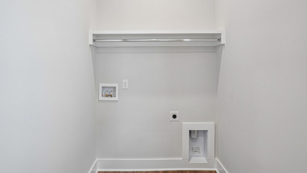 Dedicated Laundry Room with Shelving