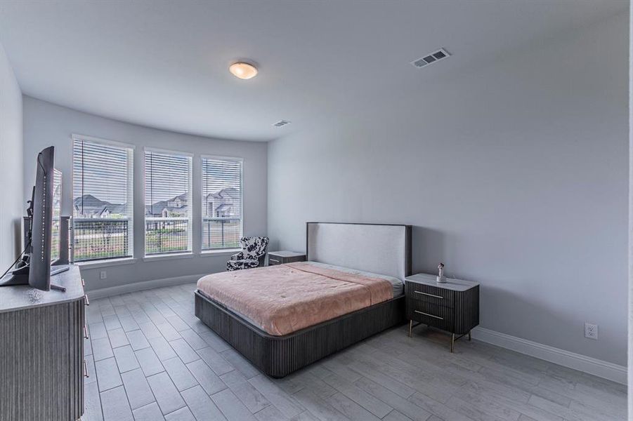 Bedroom featuring Ceramic Tile finish floors Bedroom featuring Ceramic Tile finish floors