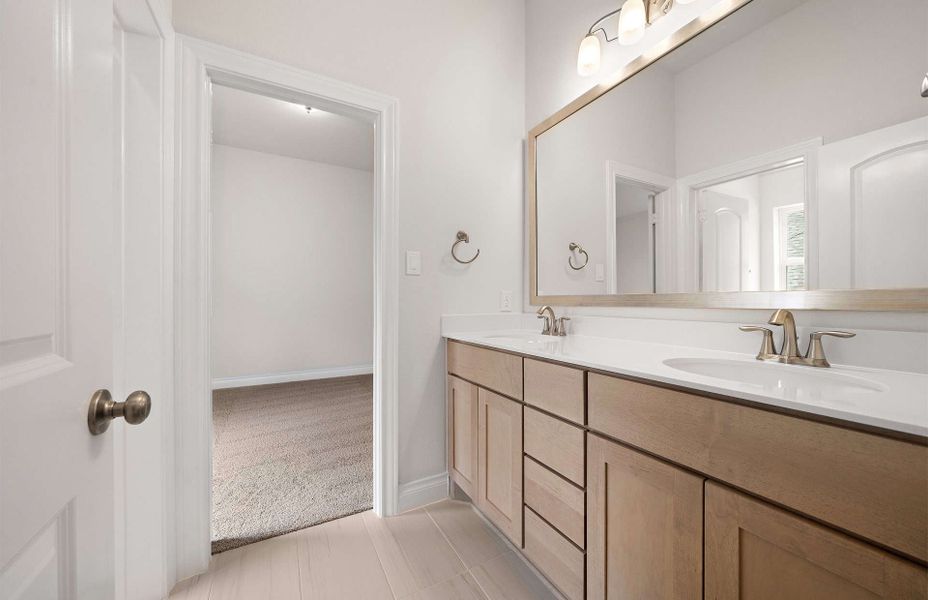 Representative furnished interior of a home built from the 3099 by Ravenna Homes in The Highlands 55′, Porter (Image 15). Representative furnished interior of a home built from the 3099 by Ravenna Homes in The Highlands 55′, Porter (Image 15).