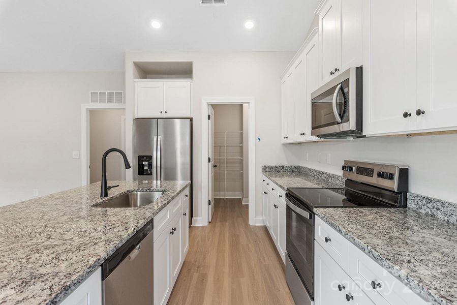 Furnished interior view inside a new home in Ascot Woods, Charlotte (Image 3).