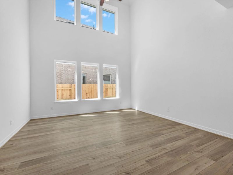 Gathering room. Sample product photo. Actual exterior and interior selections may vary by homesite. Photo may be virtually staged.