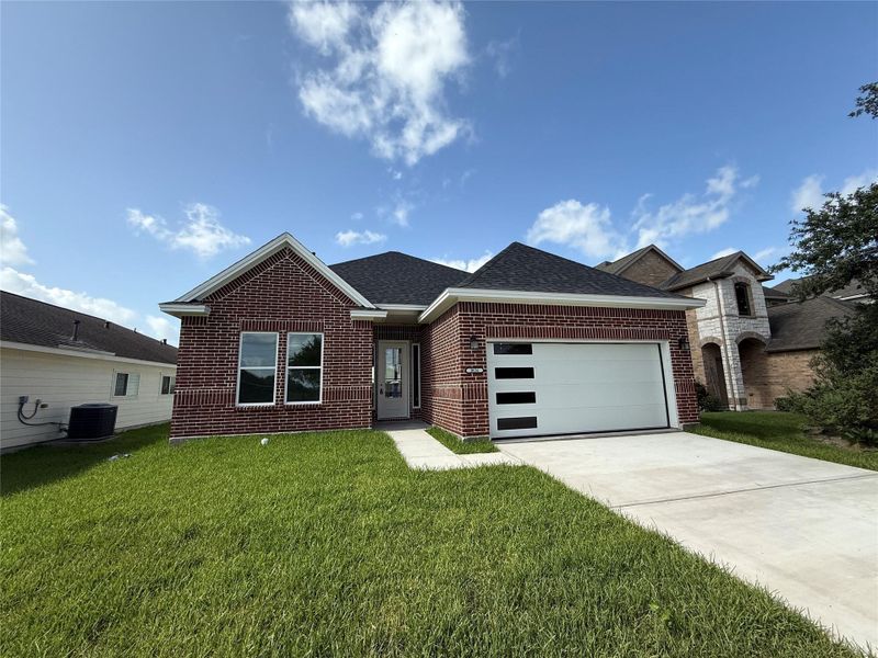 Front exterior of a new home in , Houston, TX, highlighting curb appeal (Image 1).