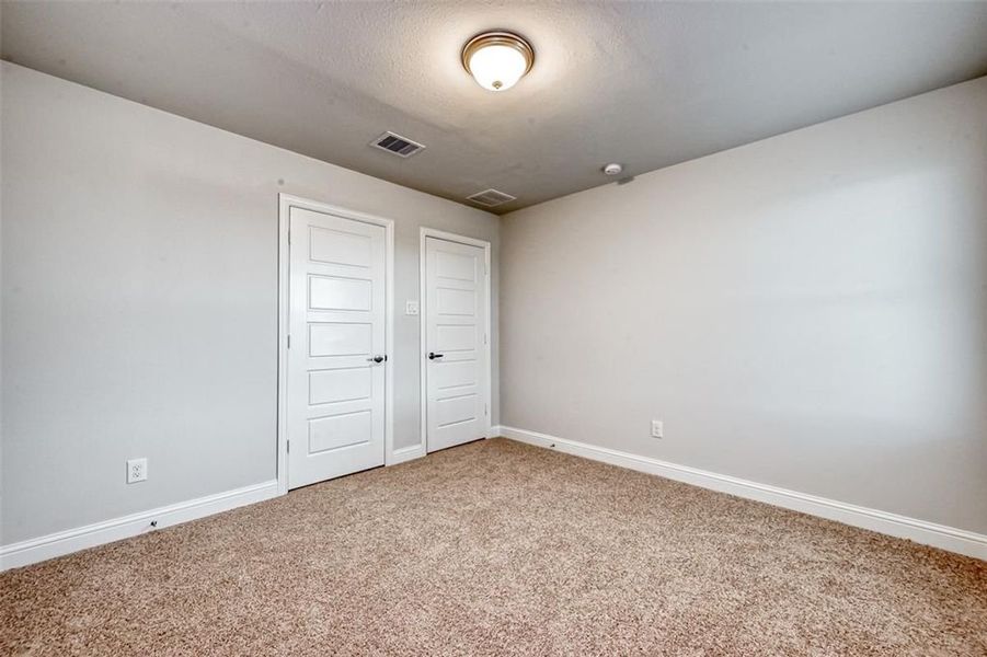 Representative unfurnished interior of a home built from the Plan 2500 by Adams Homes in The Bluffs at Lafayette, Freeport (Image 34).