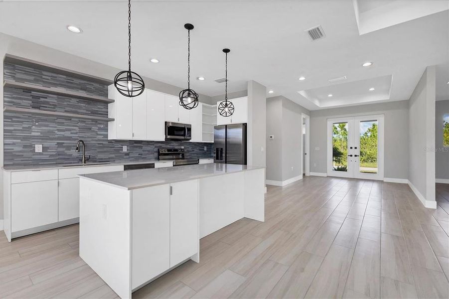Furnished interior view inside a new home in , Port Charlotte (Image 8). Furnished interior view inside a new home in , Port Charlotte (Image 8).