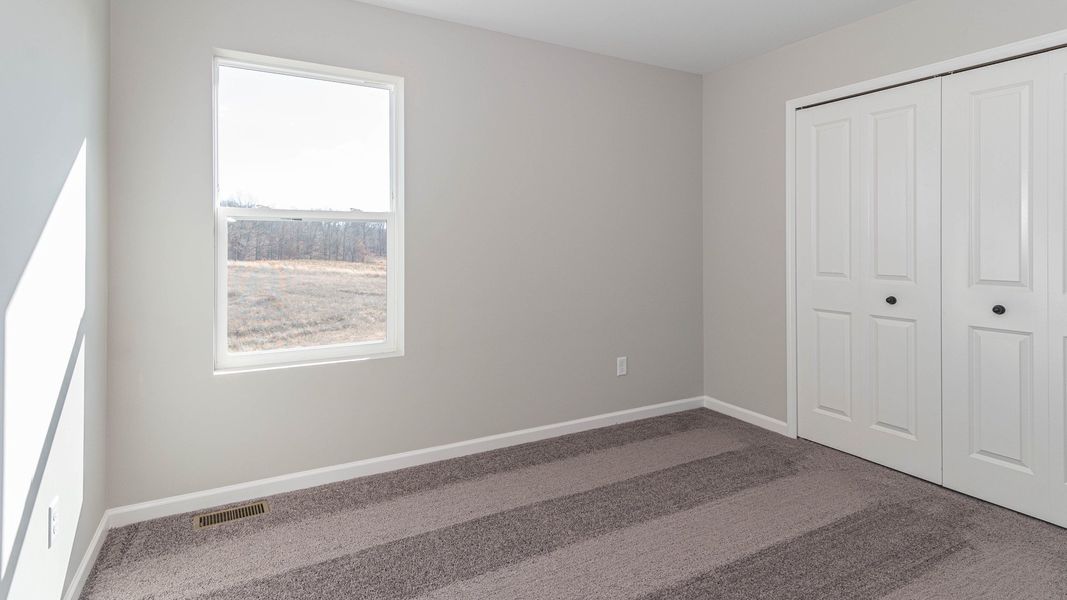 Representative unfurnished interior of a home built from the The Winslow by Norfolk Homes in Valleys, Jackson (Image 103).