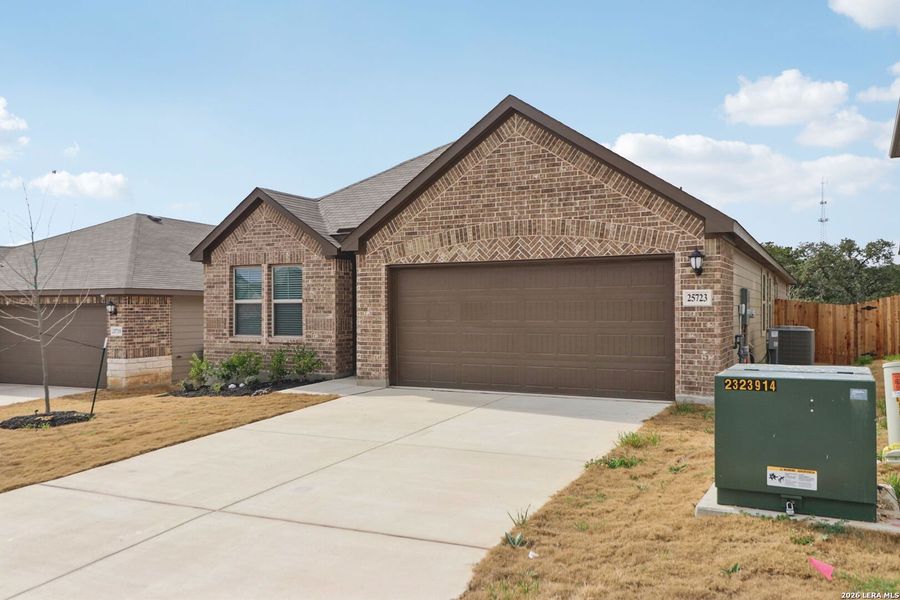Front exterior of a new home in Scenic Crest - Premier Series, Boerne, TX, highlighting curb appeal (Image 24).