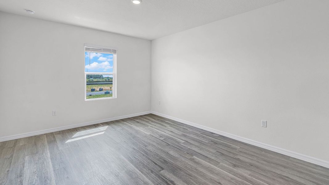 Representative unfurnished interior of a home built from the VALE by D.R. Horton in Harmony at Lake Eloise, Winter Haven (Image 28).