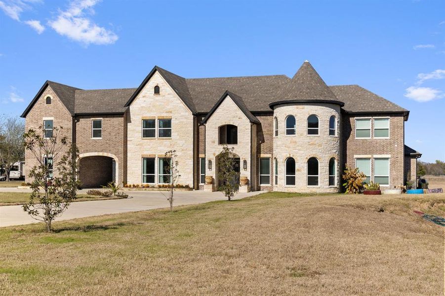 Front exterior of a new home in , Royse City, TX, highlighting curb appeal (Image 23). Front exterior of a new home in , Royse City, TX, highlighting curb appeal (Image 23).