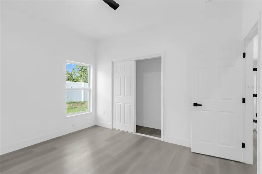 Spacious, unfurnished interior of a new home in , Weeki Wachee (Image 36).