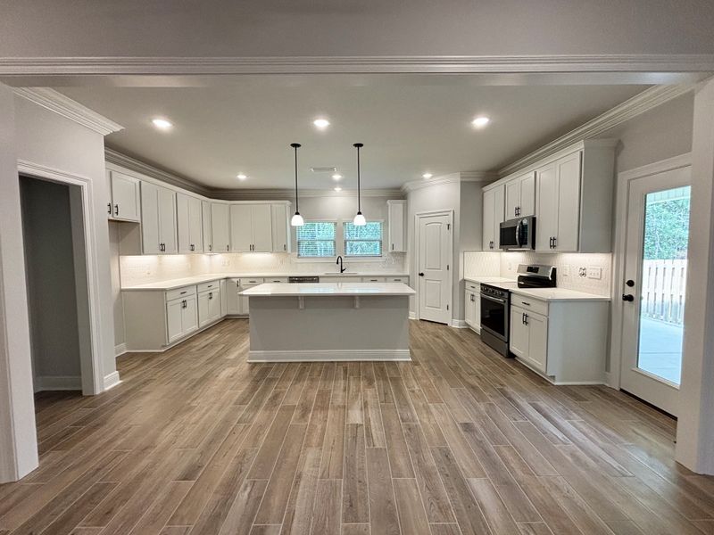 Furnished interior view inside a new home in Bird Song at Hammock Bay, Freeport (Image 5).