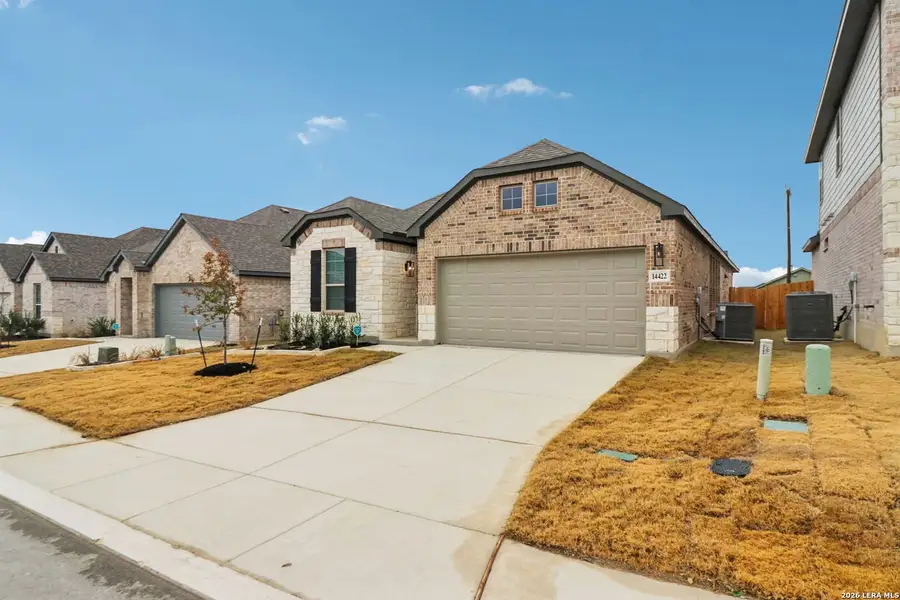 Front exterior of a new home in Kallison Ranch, San Antonio, TX, highlighting curb appeal (Image 19).