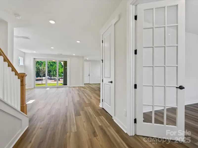 Furnished interior in a model home at The River District - Pioneer Collection in Charlotte (Image 6).