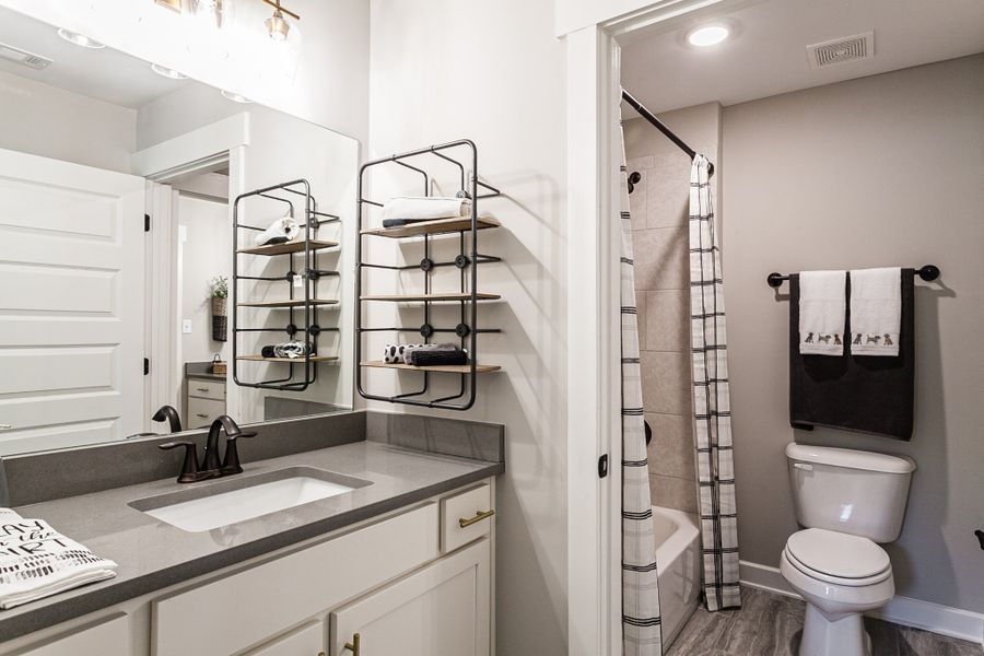 Representative furnished interior of a home built from the Bentley by Grant & Co in Manor at Hall Creek, Arlington (Image 13).