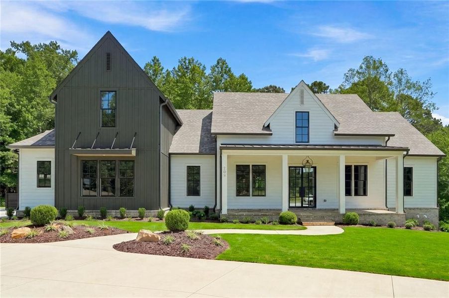Front exterior of a new home in , Canton, GA, highlighting curb appeal (Image 29).