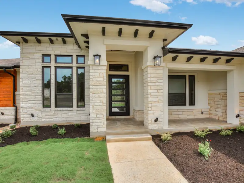 Representative exterior details of a home built from the Santa Barbara II by Giddens Homes in Scofield Farms Estates, Georgetown (Image 49).