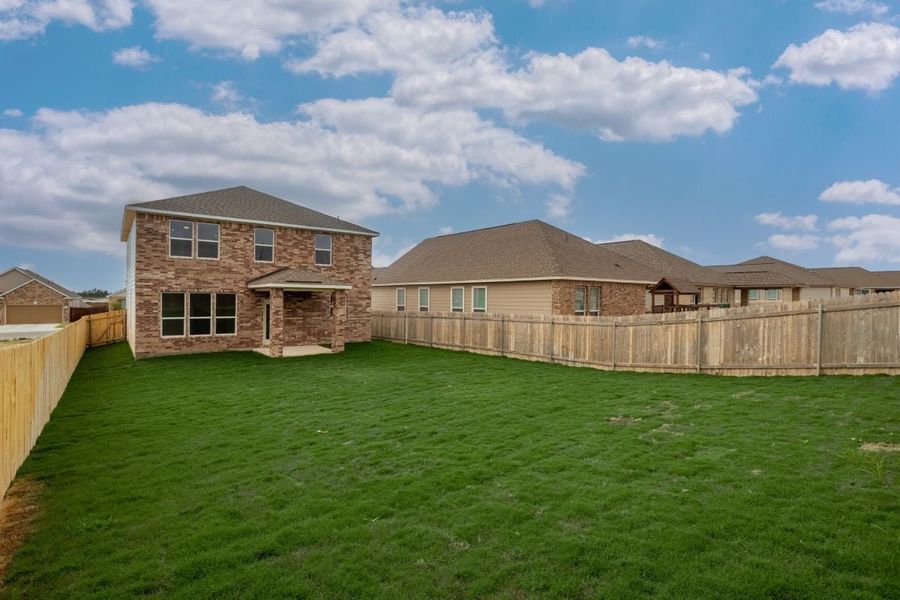 Exterior details and patio area of a home in Overlook Ranch, Georgetown (Image 4).