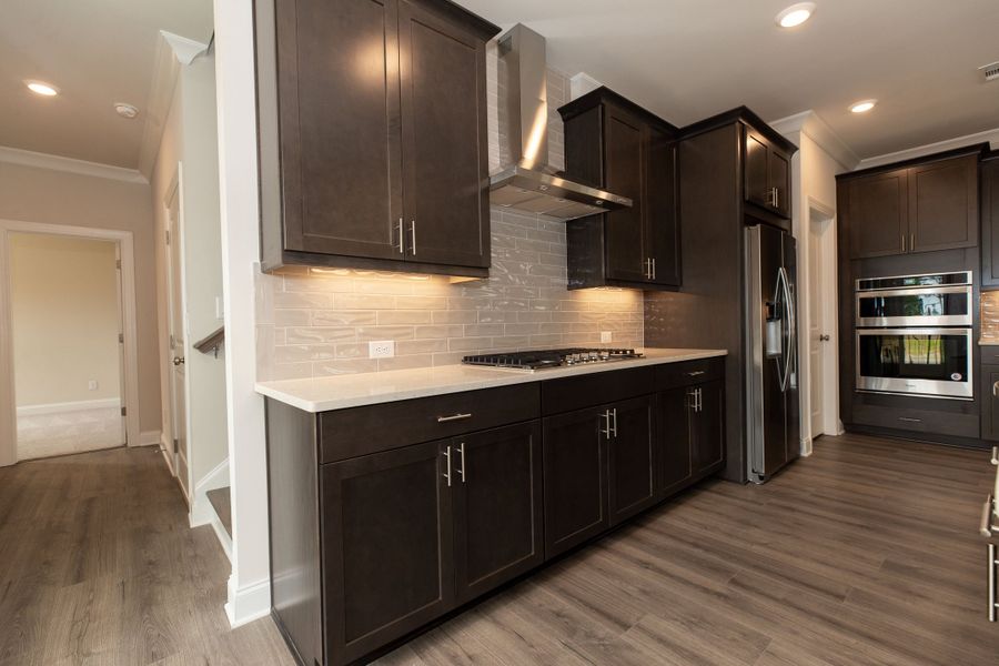 Representative furnished interior of a home built from the The Owens by The Providence Group in Waterhaven, Cumming (Image 11).