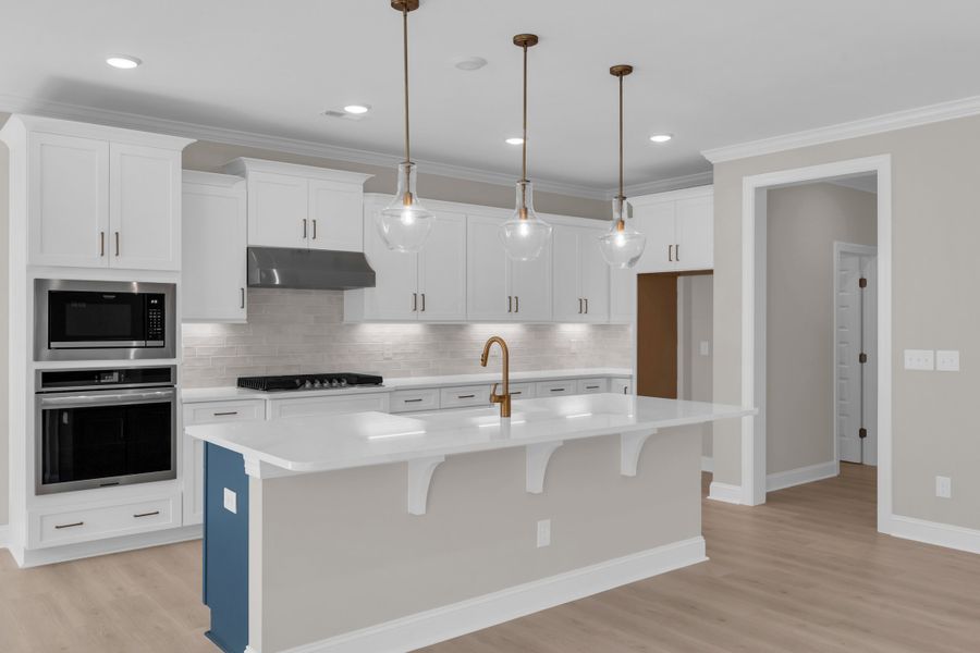 Representative furnished interior of a home built from the The Bradley by RobuckHomes in Windwater, Hampstead (Image 51).