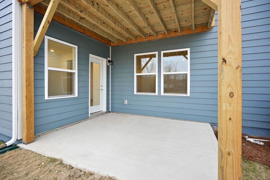 Exterior details and patio area of a home in Bryton, Huntersville (Image 32).
