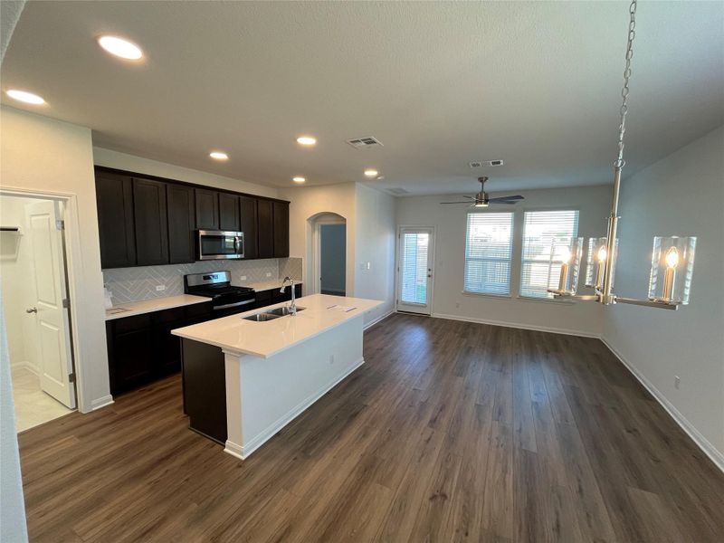 Furnished interior view inside a new home in Wellspring, Round Rock (Image 10).