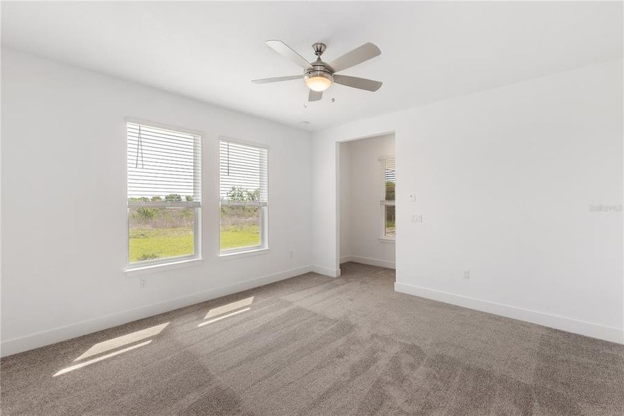 Spacious, unfurnished interior of a new home in Ocala Preserve, Ocala (Image 35).