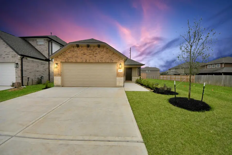 Sample photo of completed home with similar plan. As-built color and selections may vary.