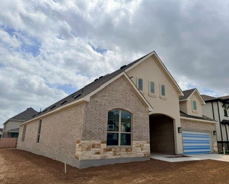 In-progress construction of a new home in Hawkes Landing, Leander, TX (Image 7).