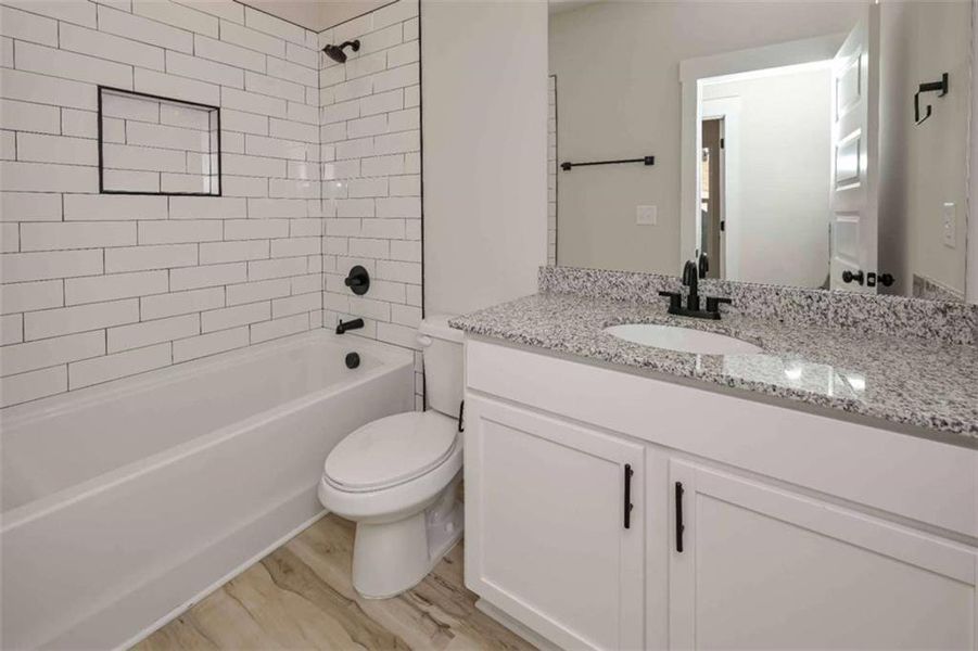 Furnished interior view inside a new home in , Buchanan (Image 5).