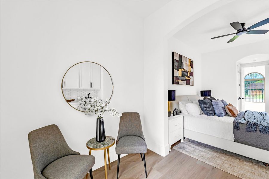 The sitting area offers ample space for a chaise lounge or a refrigerator.