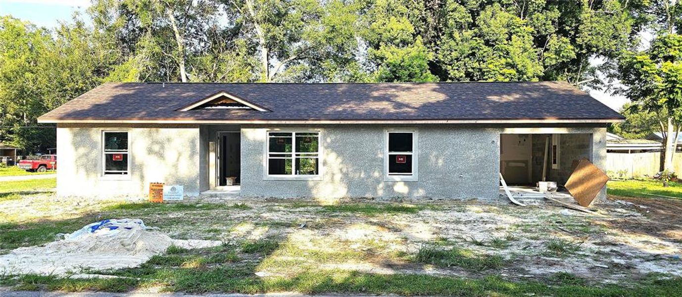 Front exterior of a new home in , Ocala, FL, highlighting curb appeal (Image 2).