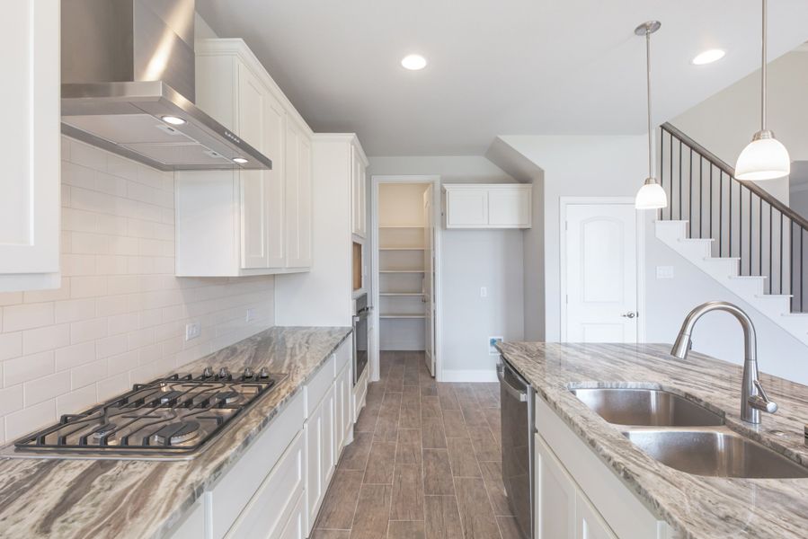 Representative furnished interior of a home built from the Nueces by UnionMain Homes in Lake Breeze, Lavon (Image 13).